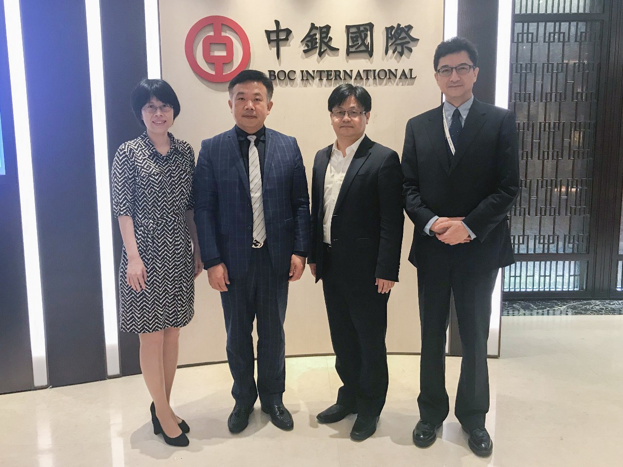 北京市道可特律师事务所主任刘光超律师、高级顾问西小虹律师、国际业务部主任张婷律师一行拜访中银国际